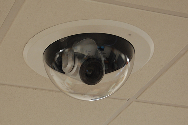 Vaddio camera embedded in tile ceiling.