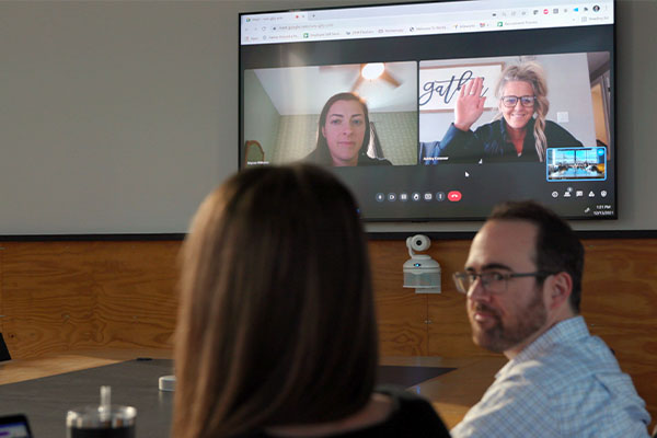 ConferenceShot in a hybrid video conferencing room.